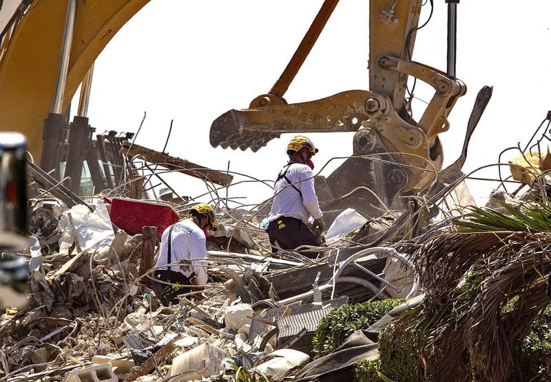 Siguen labores en edificio en Miami; van 90 fallecidos - Vimarsana News