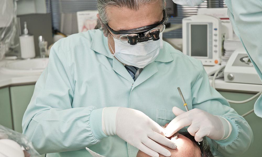 The dentist who damaged the teeth of tens of thousands of patients, in order to get money to repair them